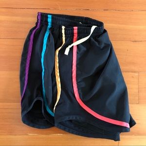 black nike shorts with colorful trim
